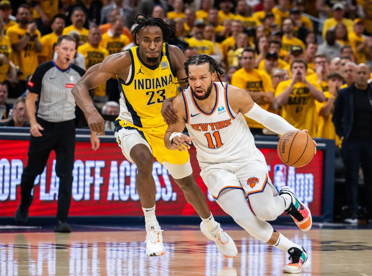 New York Knicks guard Jalen Brunson (11) dribbles the ball while Indiana Pacers forward Aaron Nesmith (23) defends during game three of the second round for the 2024 NBA playoffs