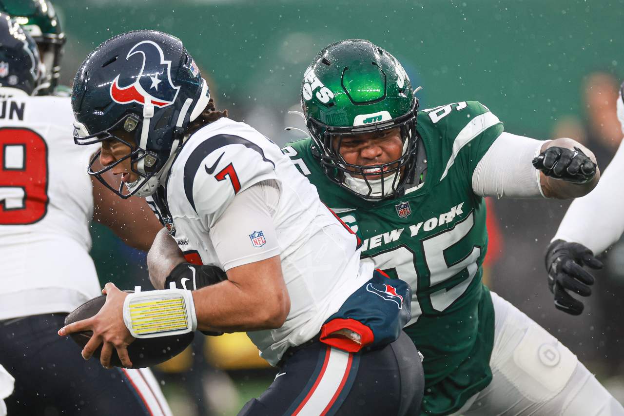 Houston Texans quarterback C.J. Stroud (7) is sacked by New York Jets defensive tackle Quinnen Williams (95) during the second half at MetLife Stadium.