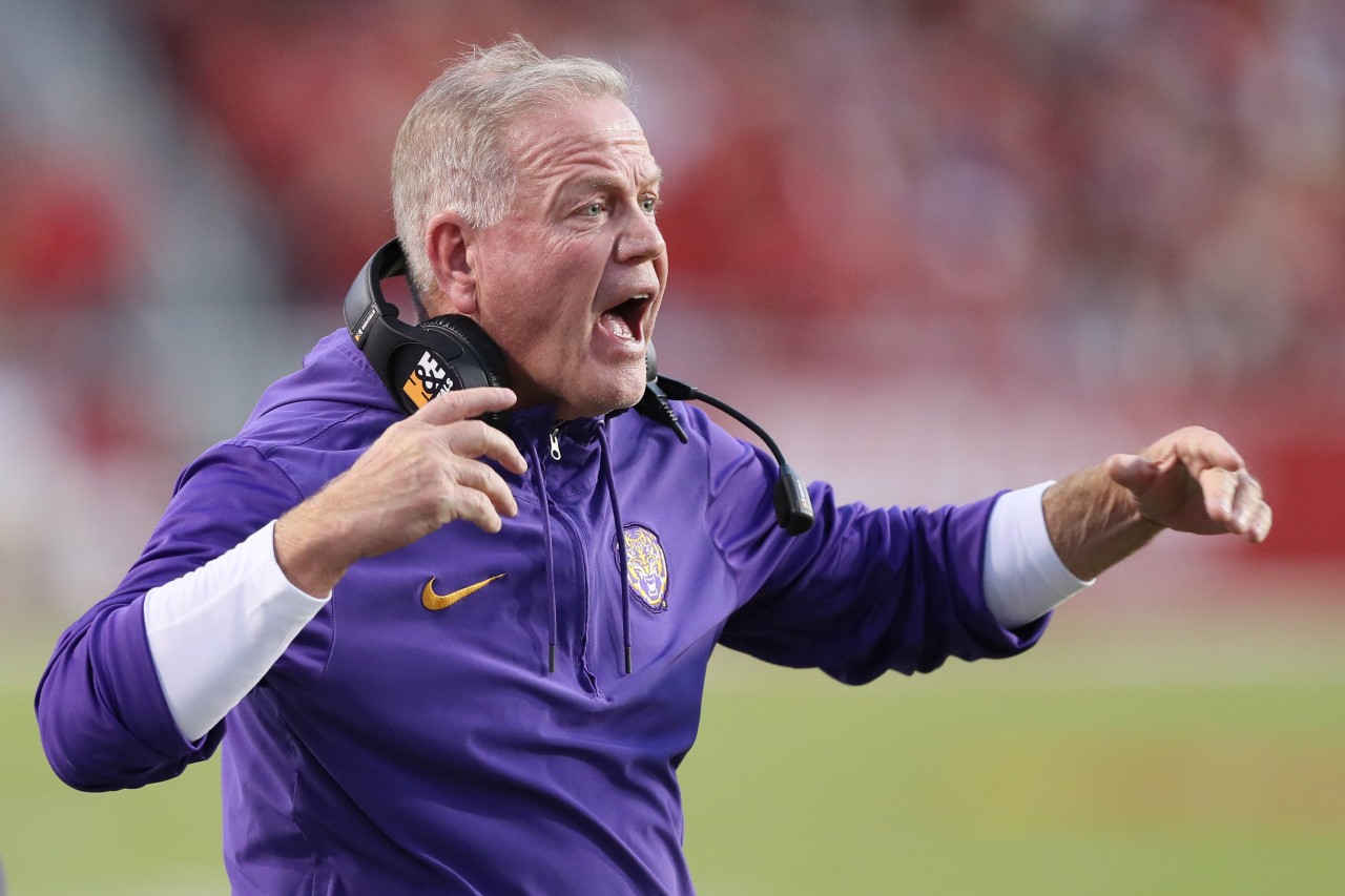 LSU Tigers head coach Brian Kelly reacts to a call during the first half against the Arkansas Razorbacks at Donald W. Reynolds Razorback Stadium.